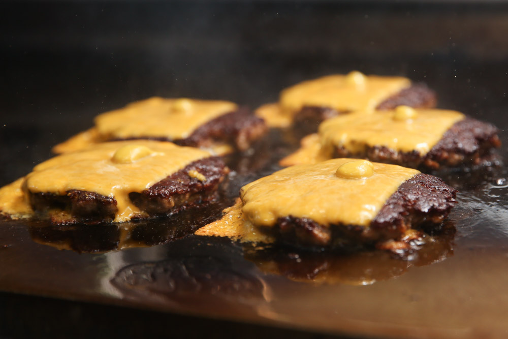 Nothing beats melted cheese on top of burgers especially when you get crispy edges where it touches the hot griddle.