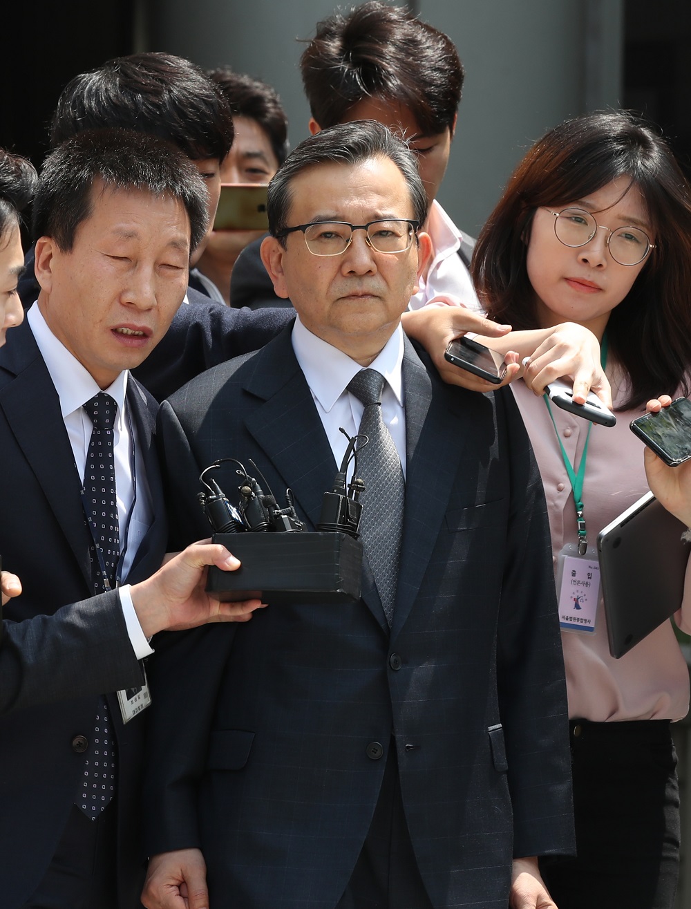 Former South Korean vice justice minister Kim Hak-ui is surrounded by the media outisde the central district court in Seoul May 16, 2019. u00e2u20acu201d AFP pic