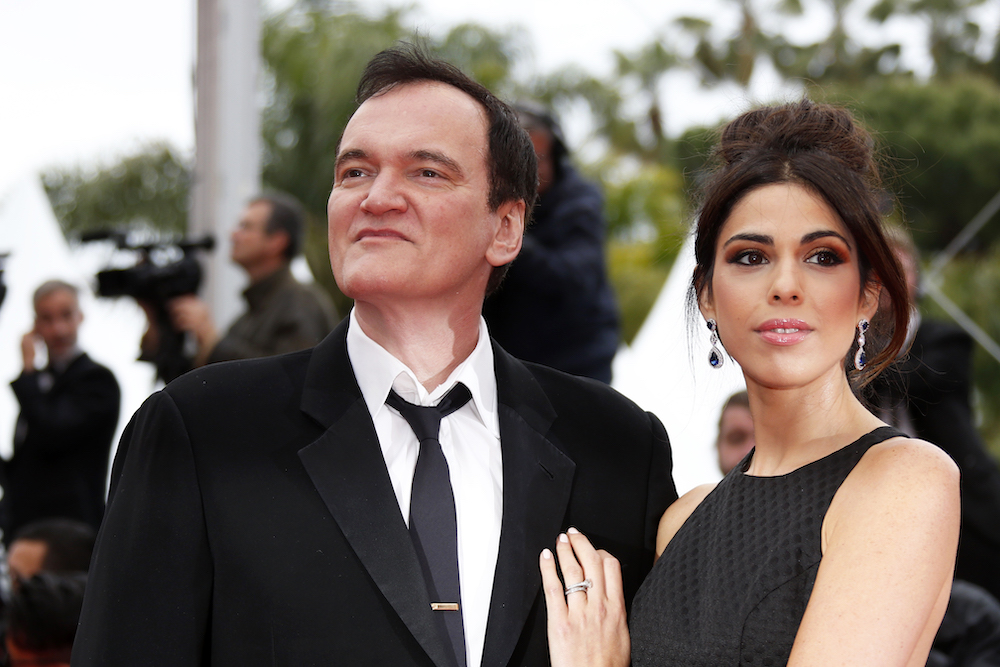 Director Quentin Tarantino and wife Daniella Pick pose on the red carpet at Cannes May 18, 2019. u00e2u20acu201d Reuters pic