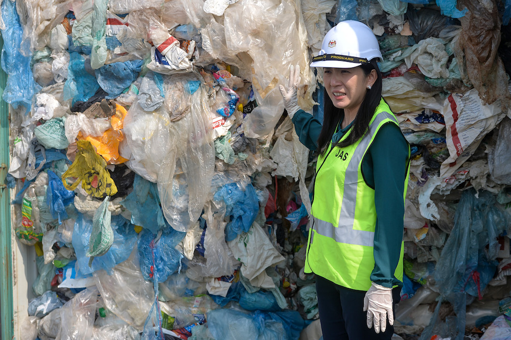 Energy, Science, Technology, Environment and Climate Change Minister Yeo Bee Yin stands in front of a container with plastic waste in Port Klang May 28, 2019. — Picture by Mukhriz Hazim