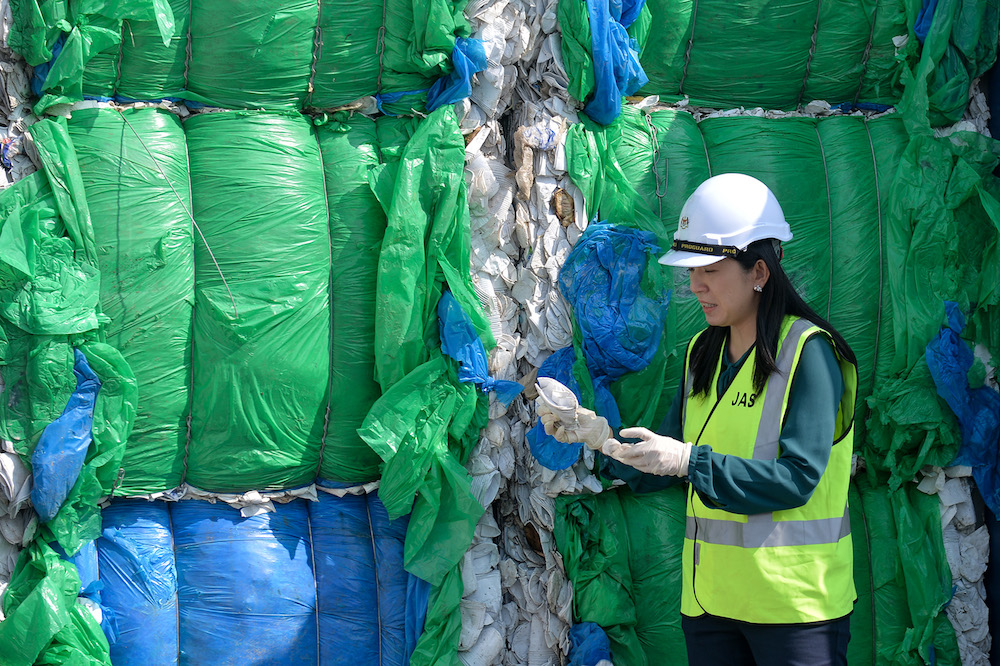 Energy, Science, Technology, Environment and Climate Change Minister Yeo Bee Yin stands in front of a container with plastic waste in Port Klang May 28, 2019. u00e2u20acu201d Picture by Mukhriz Hazim