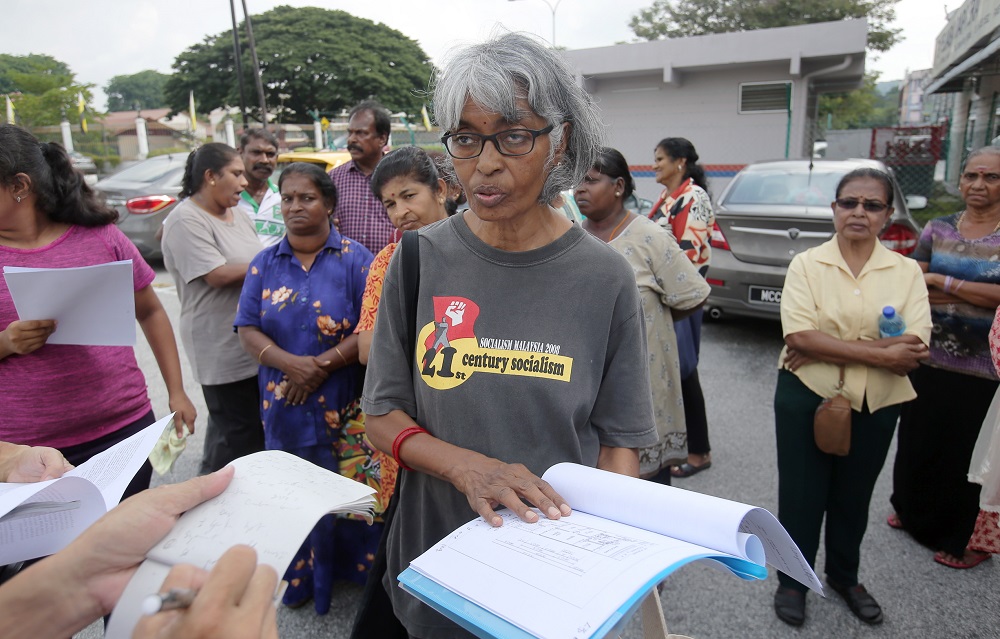 Parti Socialis Malaysia central committee member R. Mohanarani speaks to the press near the State Secretariat Building in Ipoh May 30, 2019. 