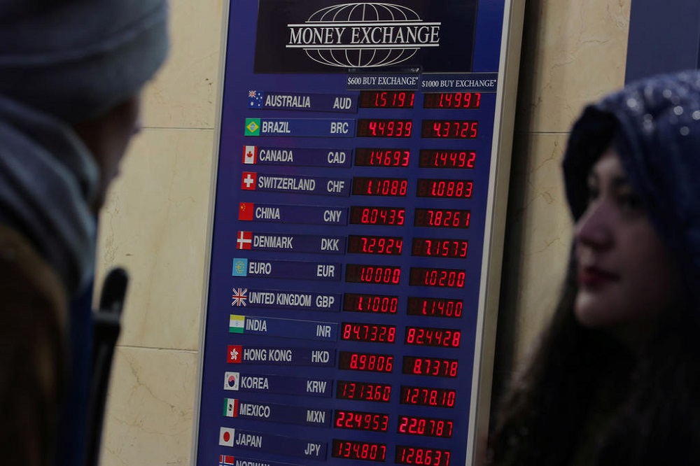 Currency exchange rates are displayed on a board at a Money Exchange kiosk in New York City, US, November 15, 2018. u00e2u20acu201d Reuters pic