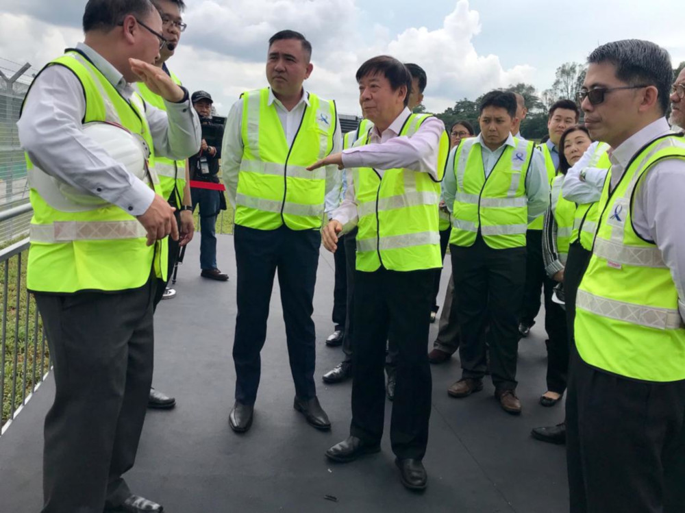Transport Minister Anthony Loke Siew Fook and his Singapore counterpart Khaw Boon Wan being briefed on the proposed Johor Baru-Singapore Rapid Transit System (RTS) station at Woodlands North in Singapore May 21, 2019. u00e2u20acu201d Picture by Ben Tan