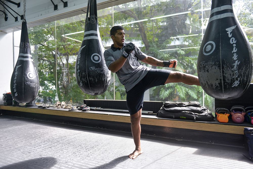 Agilan practising his kicks during a Media Day with the press at Monarchy MMA Gym Kuala Lumpur.