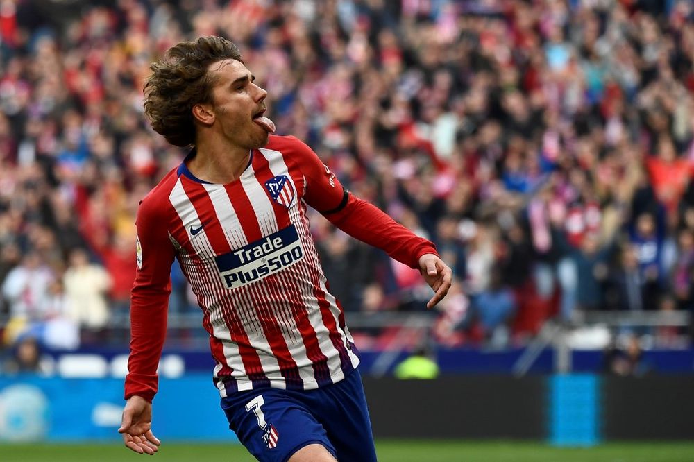 Atletico Madridu00e2u20acu2122s French forward Antoine Griezmann celebrates after scoring during the Spanish league match Atletico de Madrid vs Real Madrid CF at the Wanda Metropolitano stadium in Madrid, February 9, 2019. u00e2u20acu201d AFP pic