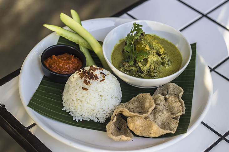 An unusual dish is the 'itik salai lemak cili' with 'belimbing buluh' served with rice 