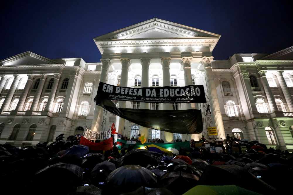 People attend a protest by students against cuts to federal spending on higher education planned by Brazil's President Jair Bolsonaro's right-wing government in Curitiba, Brazil May 30, 2019. u00e2u20acu2022 Reuters pic