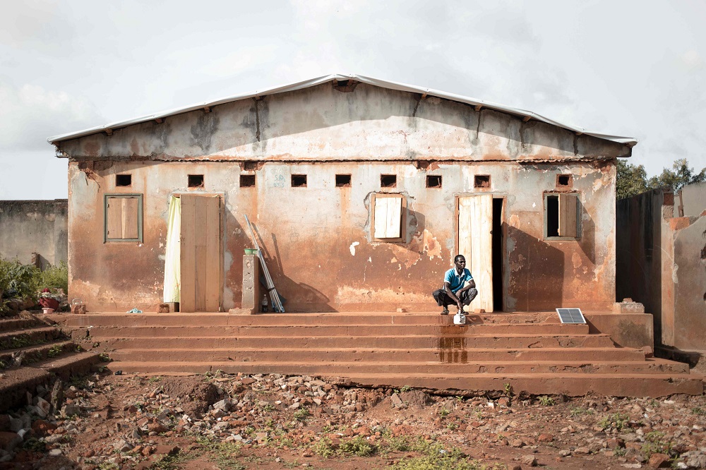 A man carries out his ablutions in his ruined house in the Tokoyo district of Bangassou May 17, 2019. u00e2u20acu201d AFP pic         