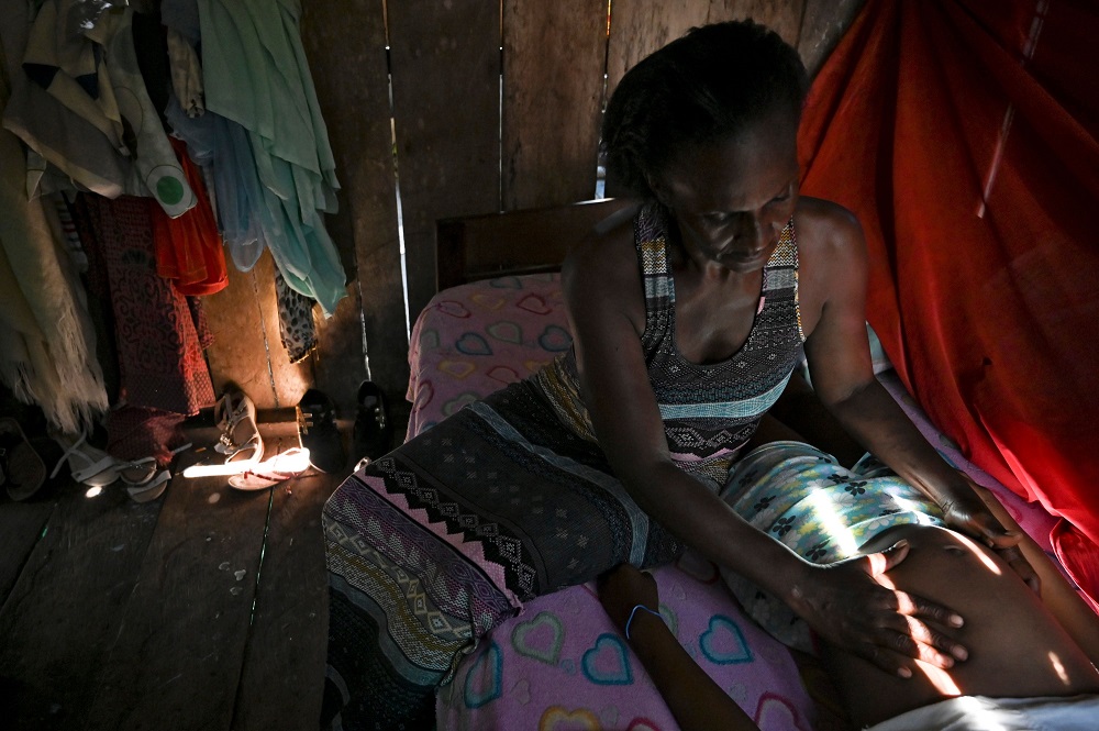 Colombian midwife Marciana Caycedo checks a pregnant woman in Isla Mono, in the San Juan river, Choco department, Colombia, on April 23, 2019. u00e2u20acu201d AFP pic        