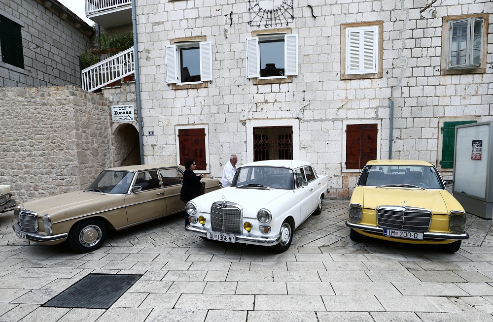 People get into an old-timer Mercedes car in Imotski, Croatia May 19, 2019. u00e2u20acu201d Reuters pic        
