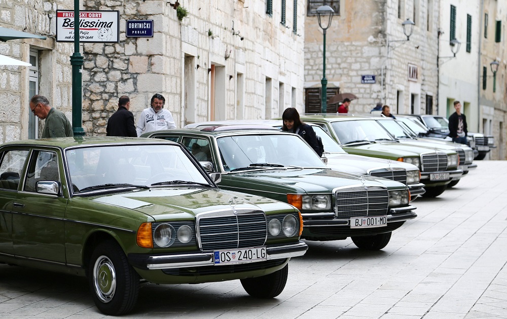 A woman looks at old-timer Mercedes cars in Imotski, Croatia May 19, 2019. — Reuters pic        