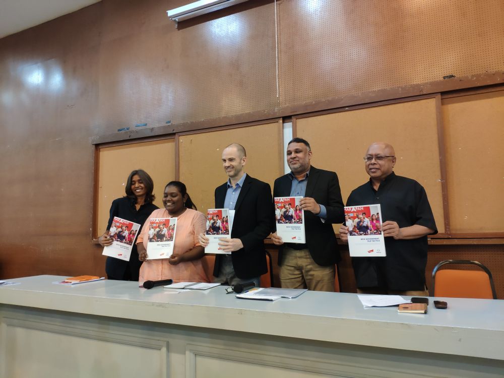 NGO representatives and academics hold up copies of the Article 19-Civictus report on Pakatan Harapanu00e2u20acu2122s first year in governance May 6, 2019. u00e2u20acu201d Picture by Terence Tang