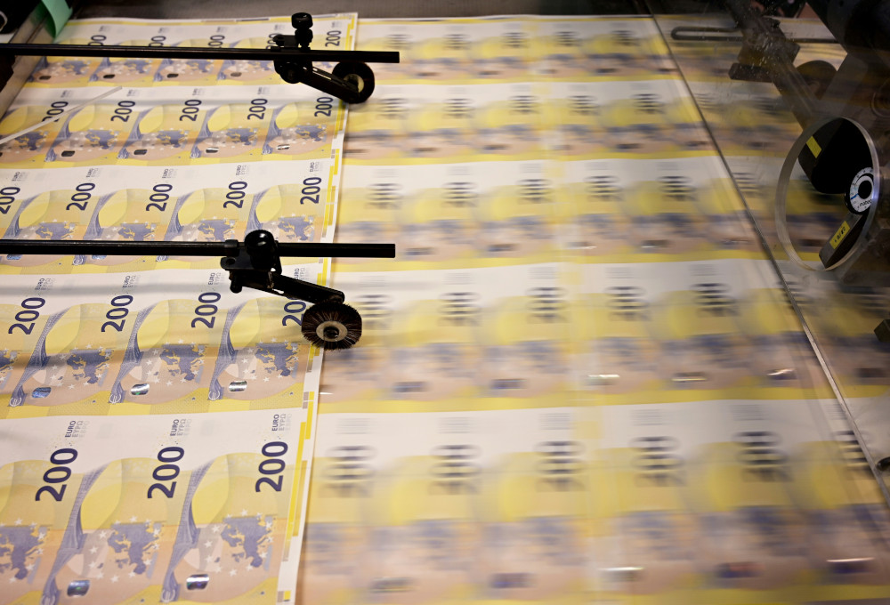 A picture taken May 20, 2019 shows the new 200 euros banknotes during the printing procedure in the Bankitalia, the Italian national central bank, high-security factory in Rome. u00e2u20acu201d AFP pic  