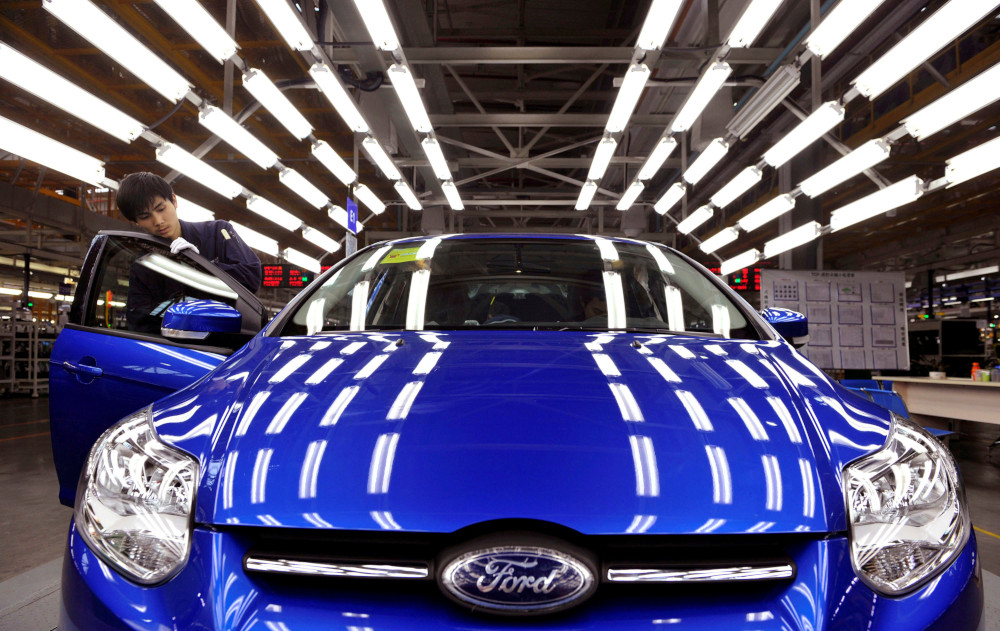 An employee works at an assembly line at a Ford manufacturing plant in Chongqing municipality April 20, 2012. u00e2u20acu201d Reuters pic 