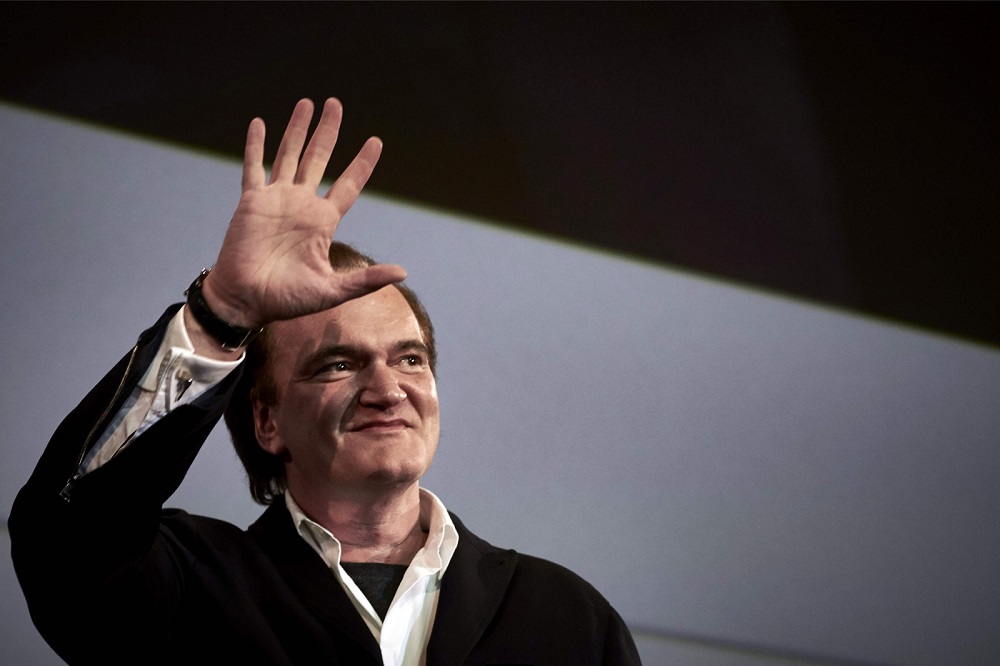 US film director Quentin Tarantino waves as he arrives for the opening ceremony of the 8th edition of Lumiere film festival in Lyon October 8, 2016. u00e2u20acu201d AFP pic