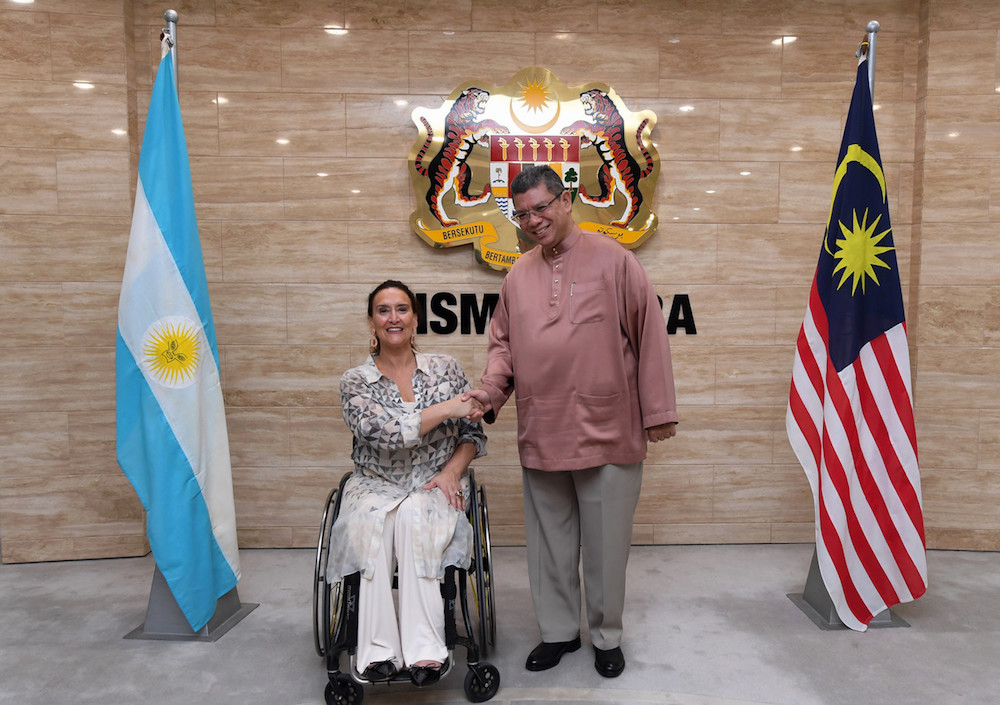 Foreign Minister Datuk Saifuddin Abdullah greets Argentinian Vice-President Marta Gabriela Michetti at Wisma Putra in Kuala Lumpur May 3, 2019. u00e2u20acu201d Bernama pic