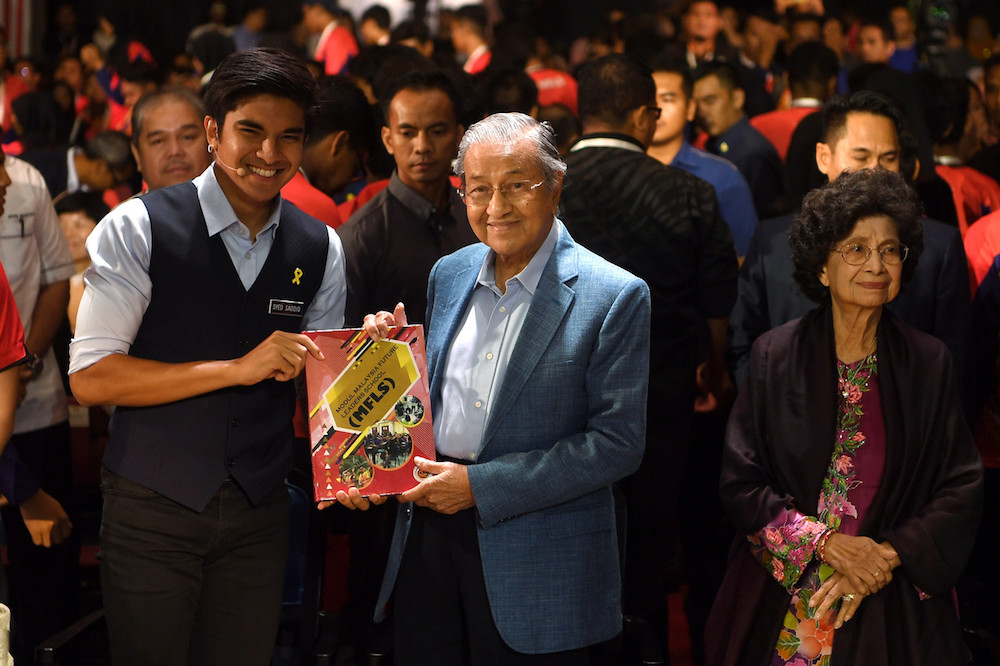 Tun Dr Mahathir Mohamad and Syed Saddiq Abdul Rahman attend the launch of the Malaysia Future Leaders School (MFLS) at Universiti Malaya in Kuala Lumpur May 3, 2019. u00e2u20acu201d Bernama pic