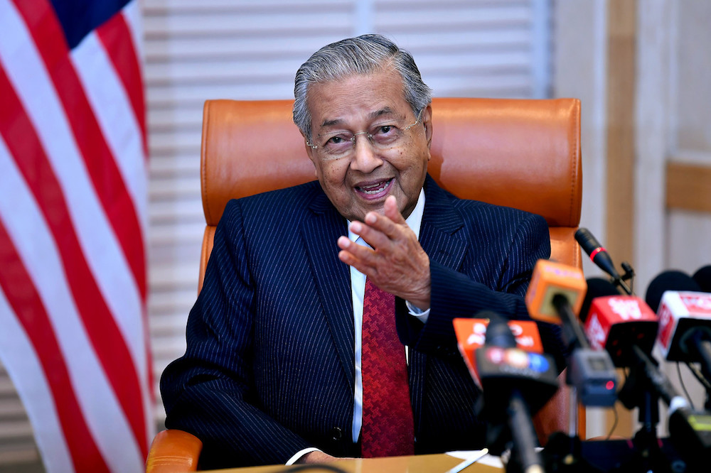 Prime Minister Tun Dr Mahathir Mohamad speaks to reporters in Putrajaya in this photo released May 8, 2019. u00e2u20acu201d Bernama pic