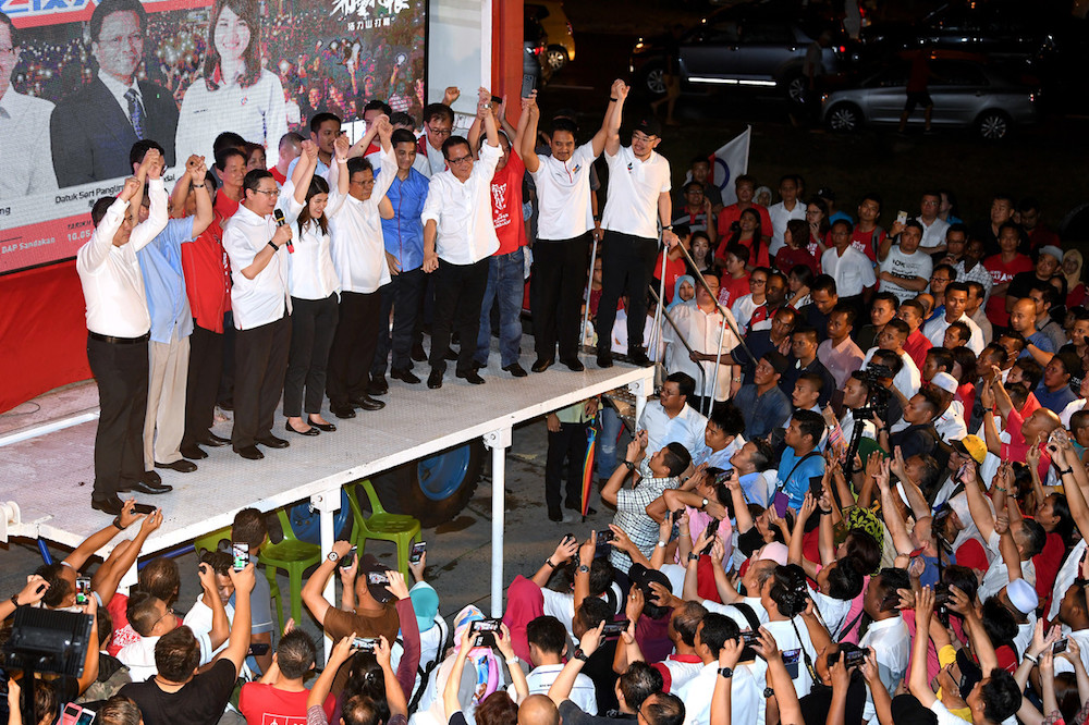 Lim Guan Eng, DAP candidate Vivian Wong and Sabah Chief Minister Datuk Seri Mohd Shafie Apdal attend a ceramah in Sandakan May 10, 2019. u00e2u20acu201d Bernama pic