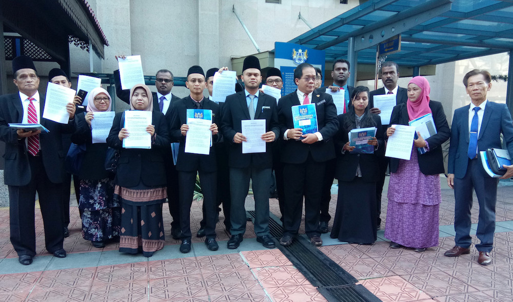 Iskandar Puteri City Council (MBIP) councillors lodge a formal complaint at the MBIP headquarters in Johor Baru May 26, 2019. u00e2u20acu201d Bernama pic