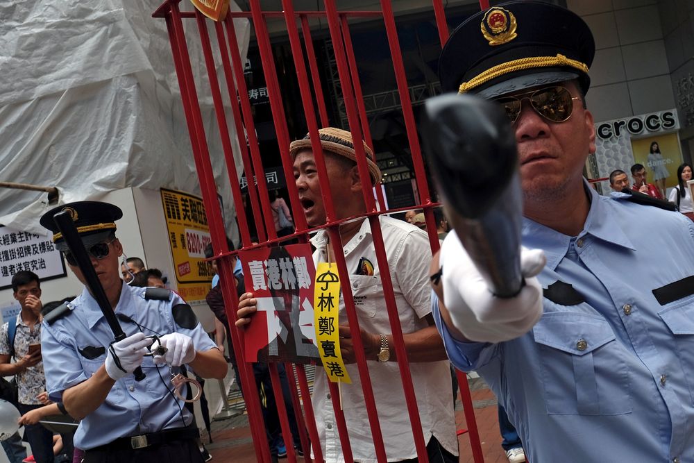 Protesters dressed as Chinese police during a protest to demand authorities scrap a proposed extradition bill with China, in Hong Kong, China April 28, 2019. u00e2u20acu201d Reuters pic