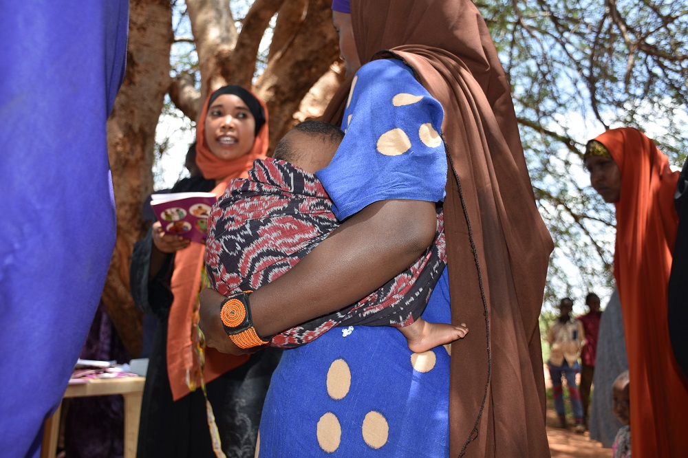 Alima Hossain, wearing a beaded solar-powered GPS bracelet, waits for her turn for health check-up in Yaballo Godha, Moyale, Kenya April 8, 2019. u00e2u20acu201d Thomson Reuters Foundation pic