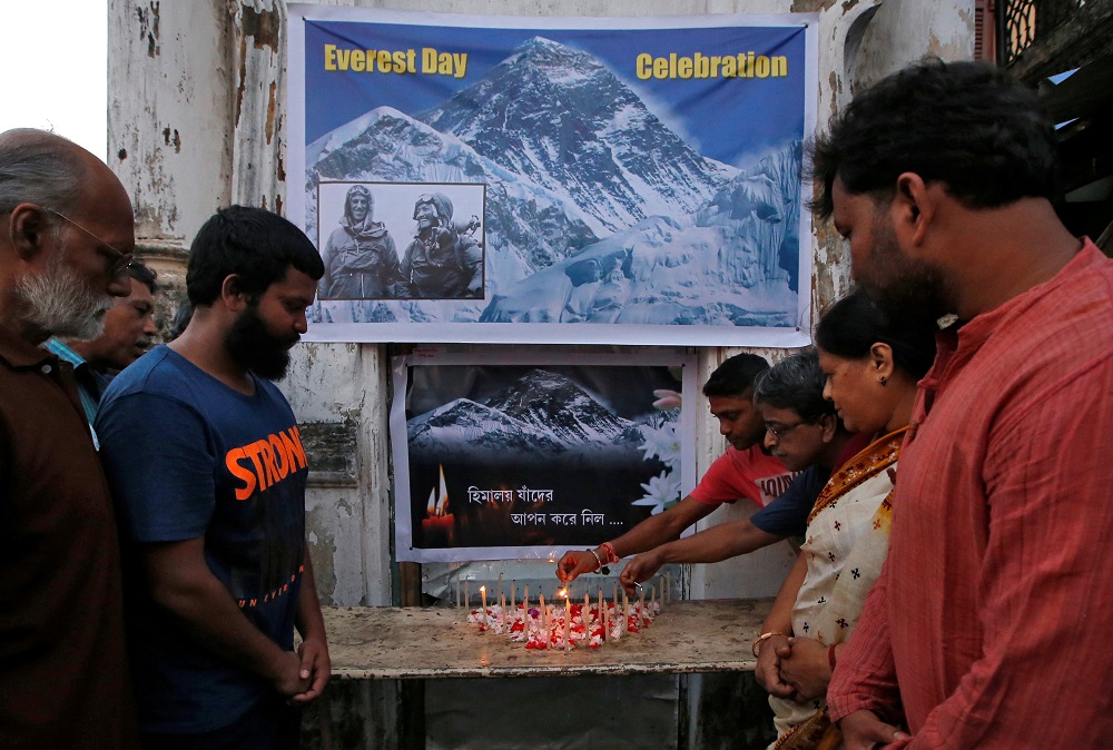 People light candles during a prayer service for those who died on Mount Everest during expeditions as they celebrate Everest Day in Kolkata, India May 29, 2019. u00e2u20acu2022 Reuters pic