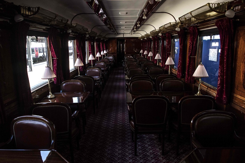 This picture taken on May 13, 2019 shows the interior of a restored carriage of an Orient Express train displayed at the Gare de lu00e2u20acu2122Est train station in Paris. u00e2u20acu201d AFP pic      