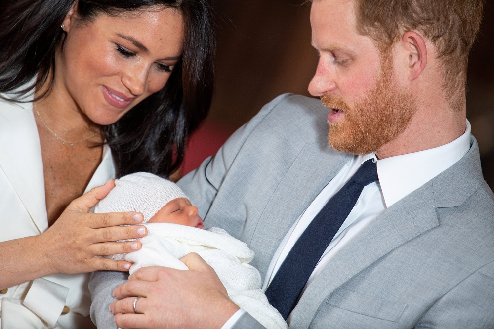 Britainu00e2u20acu2122s Prince Harry and Meghan, Duchess of Sussex hold their baby son, who was born on Monday morning, during a photocall in St Georgeu00e2u20acu2122s Hall at Windsor Castle, in Berkshire May 8, 2019. u00e2u20acu201dDominic Lipinski/Pool via Reuters pic