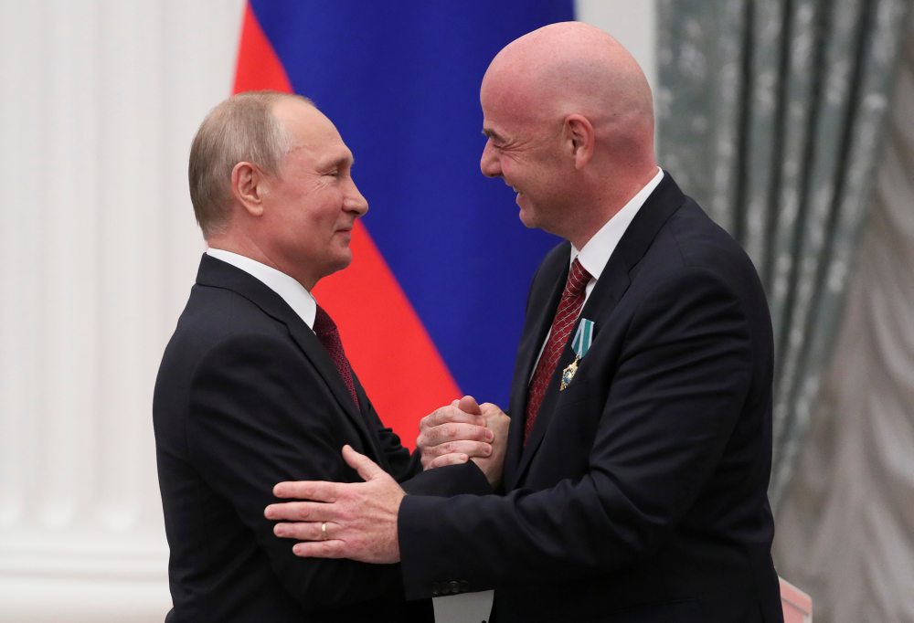 Russian President Vladimir Putin (left) shakes hands with Fifa President Gianni Infantino after awarding him the Order of Friendship during a ceremony in Moscow May 23, 2019. u00e2u20acu2022 Reuters pic