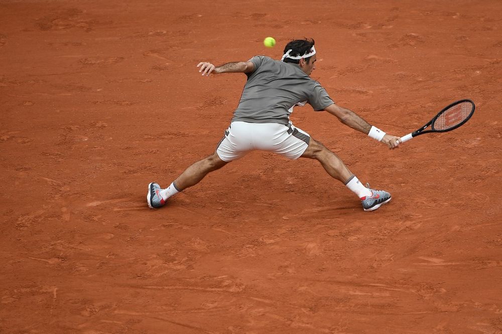 Roger Federer returns the ball to Lorenzo Sonego during their menu00e2u20acu2122s singles first round match on day 1 of The Roland Garros 2019 French Open tournament in Paris on May 26, 2019. u00e2u20acu201d AFP pic