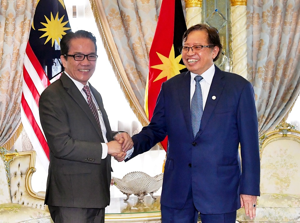 File photo shows de facto law minister Law Datuk Liew Vui Keong (left) at a meeting with Sarawak Chief Minister Datuk Patinggi Abang Johari Tun Openg at his office in Kuching April 29, 2019. u00e2u20acu201d Bernama pic