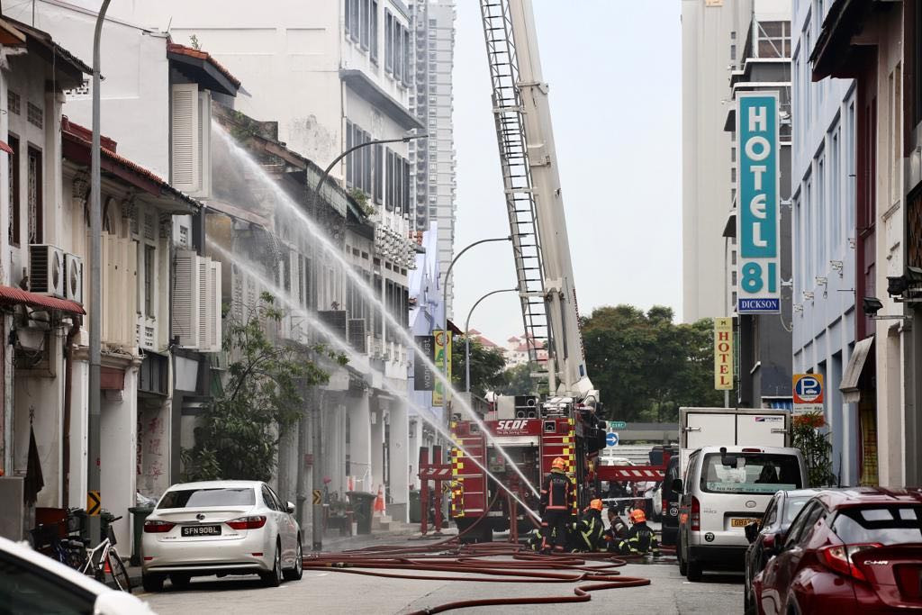 The Singapore Civil Defence Force conducts firefighting operations at 14 Dickson Road May 16, 2019. — Nuria Ling/TODAY pic