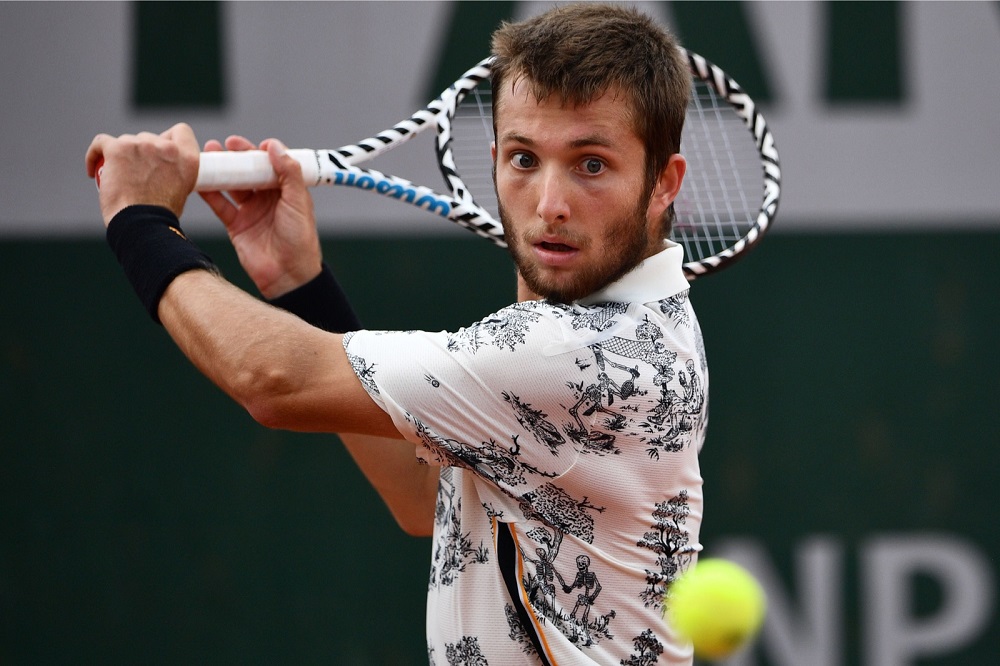 Corentin Moutet returns the ball to Guido Pella during their men's singles second round match on day four of The Roland Garros 2019 French Open tennis tournament in Paris May 29, 2019. u00e2u20acu201d AFP pic