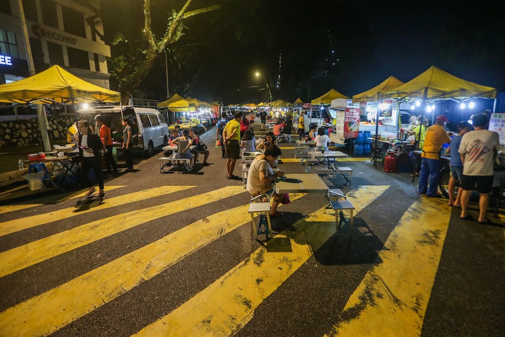 About 80 hawkers set up their stalls at this Friday ‘pasar malam’ selling everything from clothes to food. — Picture by Hari Anggara