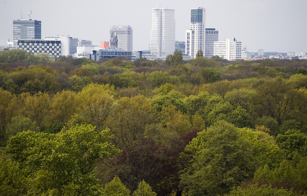 In this file photo taken on April 28, 2017 the skyline of the Zoologischer Garten neighbourhood is seen above the foliage of Tiergarten park in Berlin. u00e2u20acu201d AFP pic
