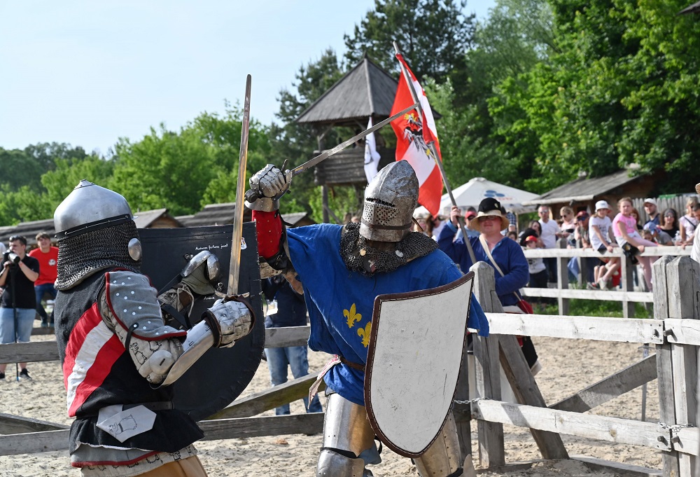 A French (right) and an Austrian fighters take part in a combat in heavy knight armour battle during the four-day world championship of Medieval combat fest (IMCF) in medieval fortress near Kiev May 18, 2019. u00e2u20acu201d AFP pic 