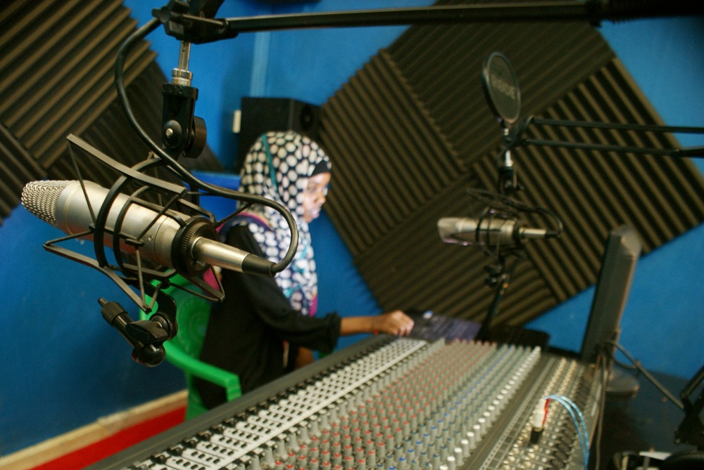 Asma Mohamed, radio station manager at Baliti FM, works from her office in Isiolo town in northern Kenya March 23 2019. u00e2u20acu201d Thomson Reuters Foundation pic