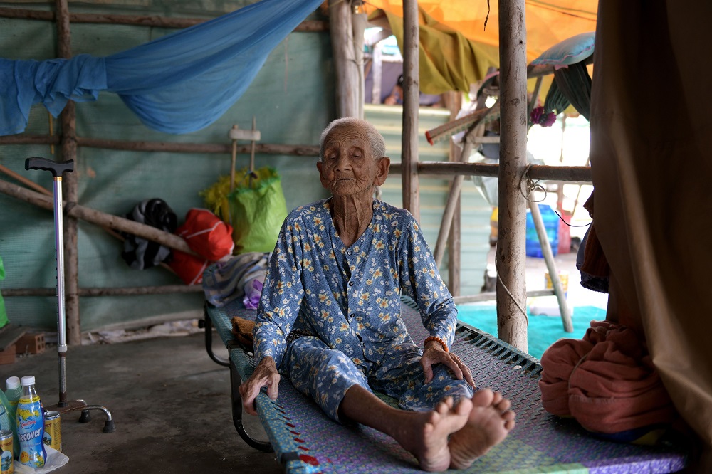 This photograph taken on April 21, 2019, shows 99-year-old Pham Thi Ca resting in her makeshift shelter in Van Phong Bay. u00e2u20acu201d AFP pic              