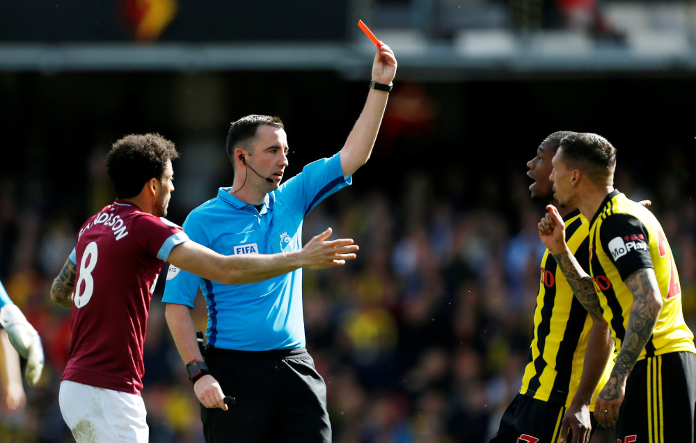 Watfordu00e2u20acu2122s Jose Holebas is shown a red card by referee Chris Kavanagh in the Premier League defeat to West Ham May 12, 2019. u00e2u20acu201d Action Images via Reuters/Craig Brough 