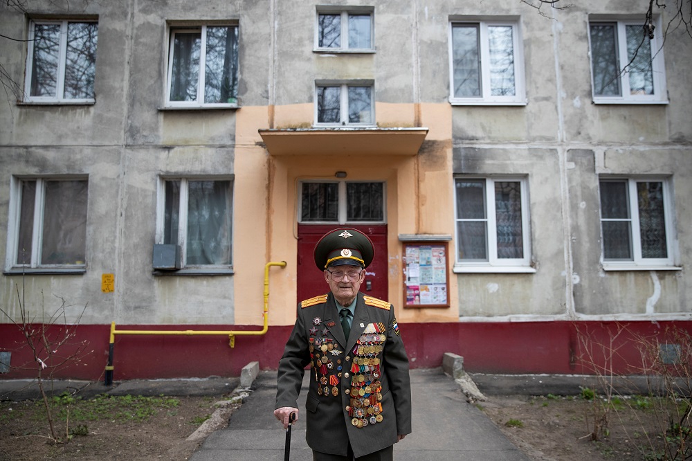 World War Two veteran Nikolay Bagayev, 100, poses for a picture dressed in his uniform, in front of his apartment block in Korolyov, north of Moscow, Russia April 18, 2019. u00e2u20acu2022 Reuters pic