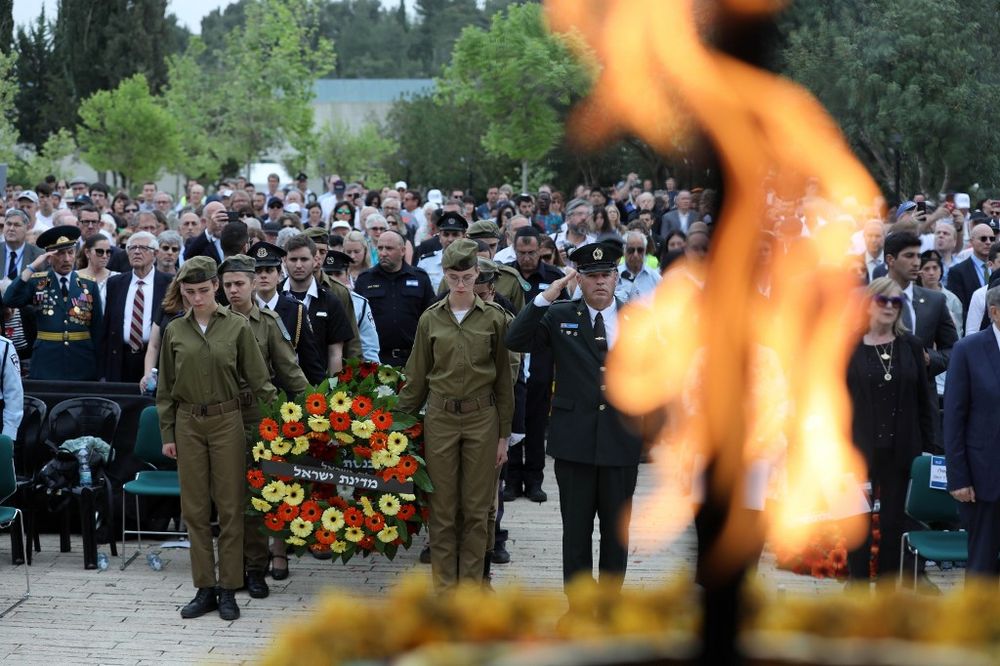 Israeli soldiers and other participants stand in silence as a siren sounds to mark the annual Holocaust Remembrance Day at Yad Vashem Holocaust Memorial in Jerusalem, on May 2, 2019. u00e2u20acu201d AFP pic