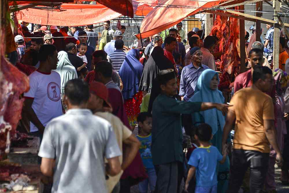 Acehnese people shop at a traditional market in Banda Aceh, Indonesia, ahead of celebrations and rituals to mark the start of the holy month of Ramadan. u00e2u20acu201d AFP pic