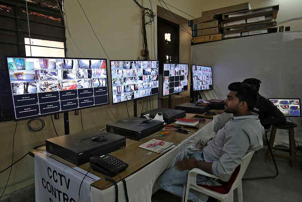 Election staff members monitor screens connected to CCTV cameras set up in and outside vote counting centres in Ahmedabad, India May 21, 2019. u00e2u20acu201d Reuters pic
