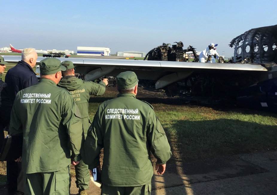 Chairman of Russia's Investigative Committee Alexander Bastrykin (second left) visits the scene of the Aeroflot Sukhoi Superjet 100 plane at Moscow's Sheremetyevo airport May 6, 2019. u00e2u20acu201d Reuters pic