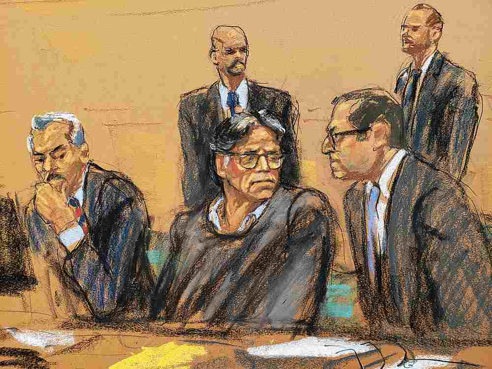 Former self-help guru Keith Raniere (centre) and defence attorney Marc Agnifilo (right) are seen, in this courtroom sketch, at the Brooklyn Federal Courthouse in New York May 7, 2019. u00e2u20acu201d Reuters image