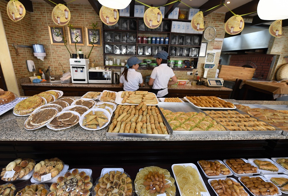 The al-Rabat Sweets and Bakery, founded by Iraqi immigrants in the UAE, is pictured during the Muslim holy month of Ramadan, in Sharjah May 28, 2019. u00e2u20acu201d AFP pic 