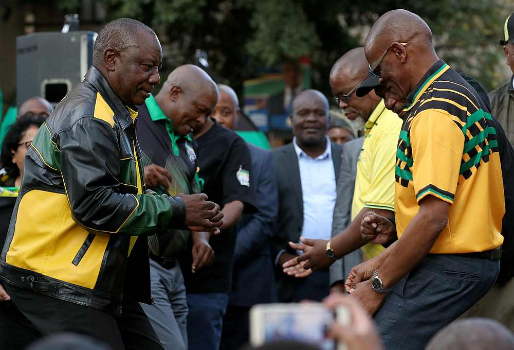 President Cyril Ramaphosa (left) dances with office bearers of his ruling African National Congress (ANC) at an election victory rally in Johannesburg, South Africa May 12, 2019 u00e2u20acu201d Reuters pic
