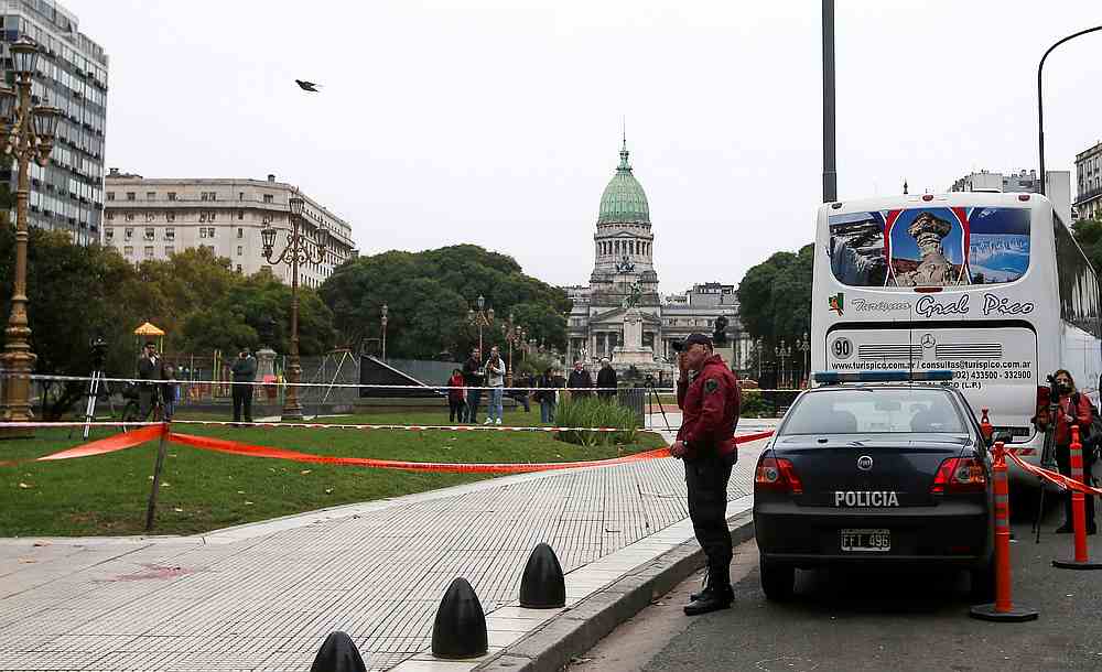 A police officer next to the crime scene after Argentine Congressman Hector Olivares was injured and his adviser, Miguel Yadon, killed near the National Congress in Buenos Aires May 9, 2019. u00e2u20acu201d Reuters pic